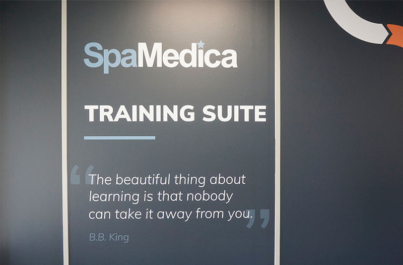sign reading SpaMedica Training Suite "The beautiful thing about learning is that nobody can take it away from you" B.B. King
