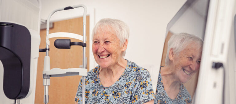 Happy SpaMedica patient having her eyes examined