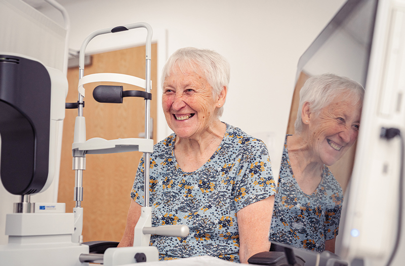 Delighted SpaMedica patient waiting to have eye tested during pre assessment