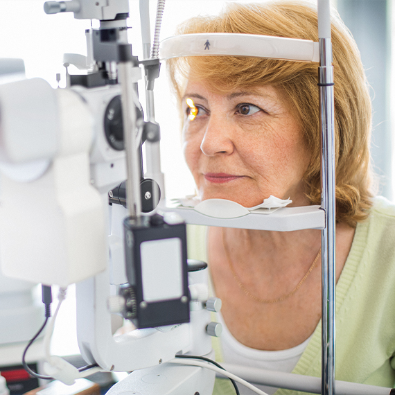 patient having eye tested by optometrist
