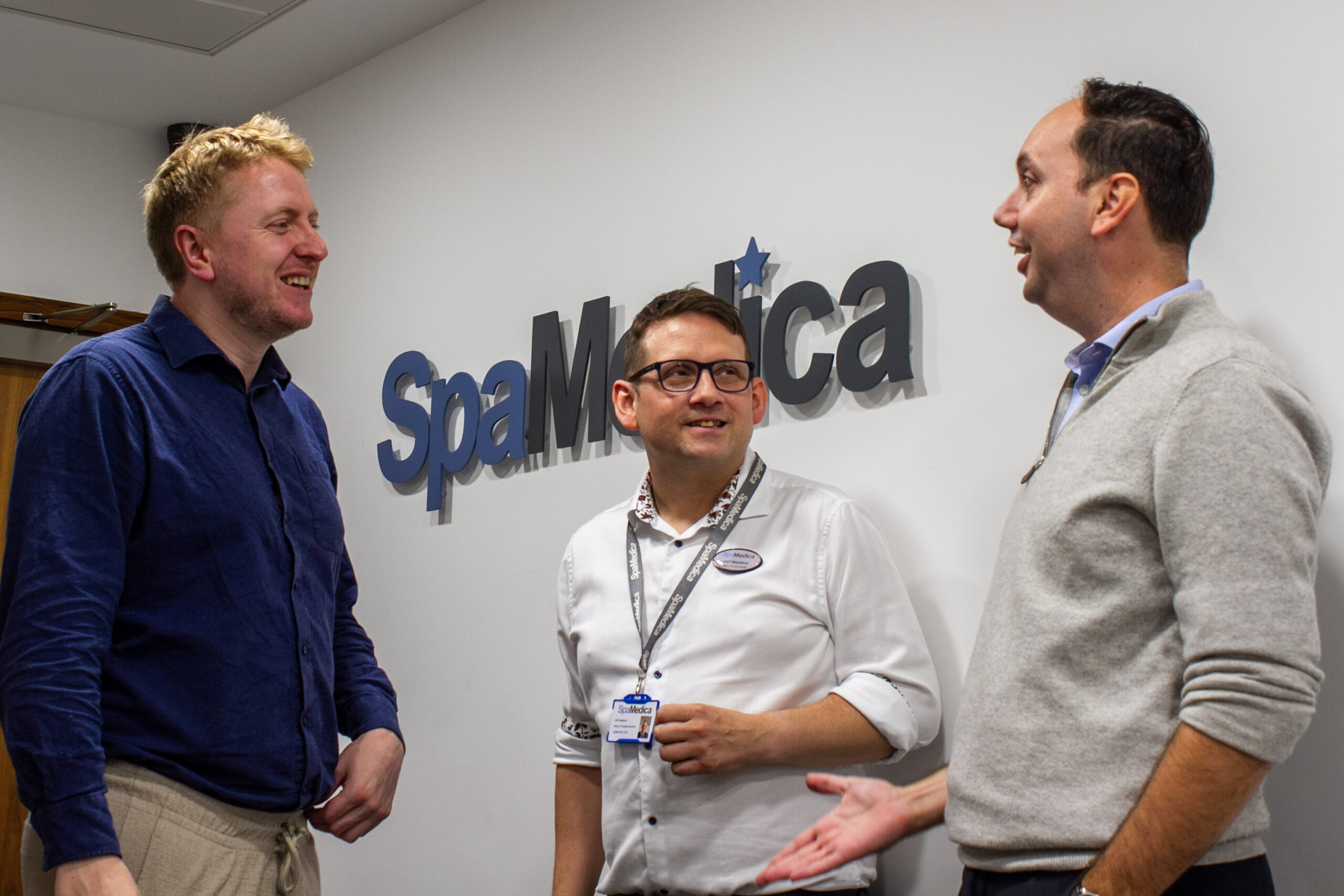 Image of Alex Silvester and Cliff Waddicor greeting Mark Logan MP