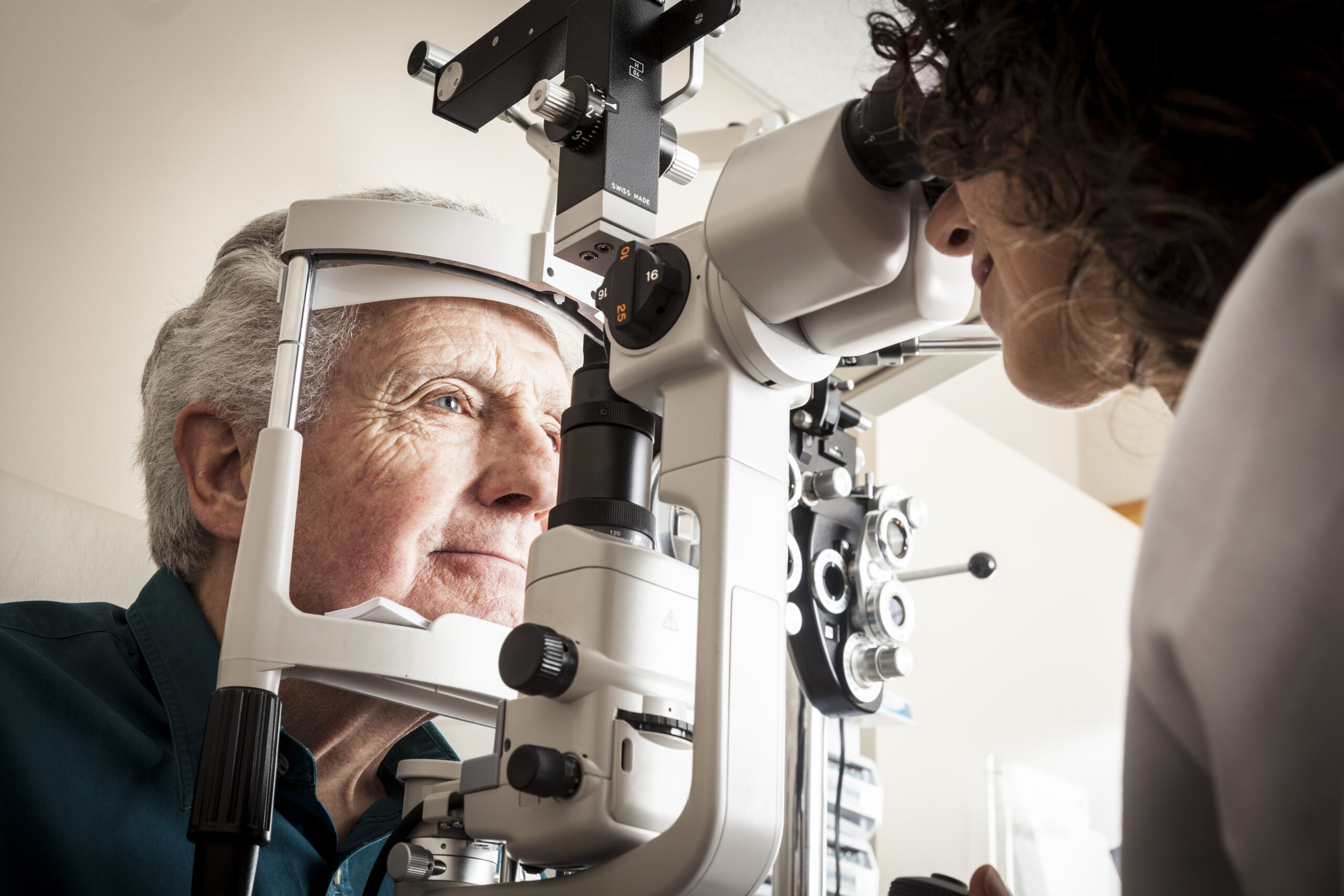 Elderly man having an eye test