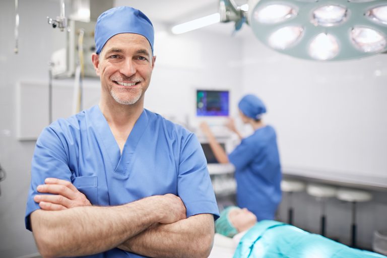 Team of surgeons in operating room at a hospital
